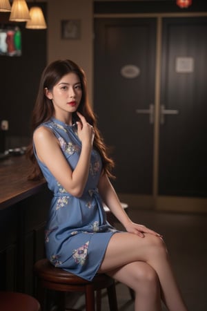 A young Asian woman sits at a dimly lit bar, her long brown hair spilling over her shoulders like a waterfall. Wearing a sleeveless blue dress adorned with floral patterns, she applies bold red lipstick, drawing attention to her striking features. Perched on a worn brown stool, her left hand rests on the counter, subtly grounding her pose. The blurred backdrop hints at a bustling bar scene beyond her, while the subdued lighting creates a vibrant contrast, making her pop against the muted environment.