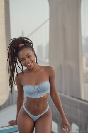 Magical noon in New York city. Mysterious African American indie beauty, very dark matte skin, long dreadlocks hair , smiling, close up shot of a gorgeous woman with a two piece blue and white swimsuit in lace, showcasing her tall and slender physique , posing in a fashion shoot in a roof of Brooklyn , with the famous Brooklyn Bridge landmarks , in summer , excellent composition, dynamic pose, beautiful detailed, intricate textures, medium format camera, Hasselblad