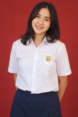 smp_uniform, A medium full shot of realistic hild4, a woman wearing white collared button-down shirt adorned with a smp_logo on the right pocket of the shirt. The woman is wearing a dark blue skirt. The background is a red. focus on outfit.