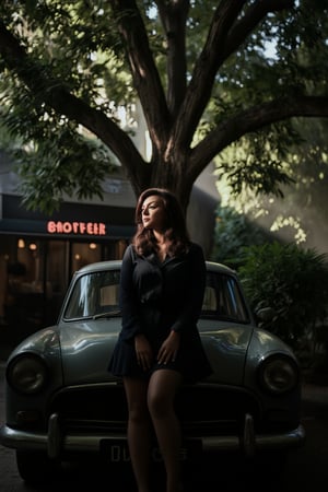 A woman's tranquil face fills the frame, positioned on the vintage automobile's hood, shrouded in the darkness beneath the ancient tree's sprawling canopy. Her attire exudes classic elegance, while the misty atmosphere and ray of soft light dancing through the leaves imbue the scene with mystique. In the background, a coffee shop's sign creaks gently in the morning breeze.,SHORT,AWA,Mallu woman