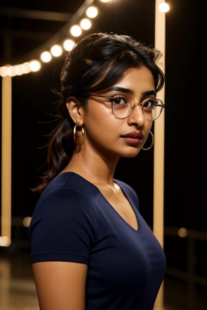 full format photo-realistic wide shot image of a Pakistani woman, Radhika Apte, Priyanka Chopra Jonas, short ponytail, wearing glasses, confident hype expression, wearing a navy blue ribbed T-shirt that is tight-fitting, a curvy figure, big nose,

standing in the middle of a dance, concert, colorful party lights, night, candid photo, full body shot, ((wide shot)), low angle shot, 

small gold earrings, dark skin, nice skin, natural skin texture, highly detailed 8k skin texture, 

detailed face, detailed nose, realism, realistic, raw, photorealistic, stunning realistic photograph, smooth, actress ,more detail , 