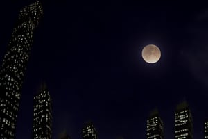 night, dark blue sky with blurry white clouds, full moon, black rectangular skyscrapers with small windows in which white light is visible, metal superstructures are visible at the tops of skyscrapers, brown cubes and a few gray cubes are visible at the base of skyscrapers, the earth is brown mud or clay, far focus, twinkling windows and stars, brilliant coloring, crispy quality, vray; Pixar, ; HD, HDR, SF, CGSociety, 16k, photorealistic, unreal engine