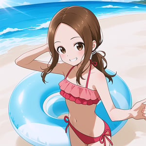 Aged up Aatakagi with parted bangs, standing straight-on on a beach, wearing a frilled pink bikini. She has a cowboy shot framing, smiling, with long brown hair tied in a low ponytail. The scene is brightly lit, capturing her relaxed pose and the vibrant beach setting.