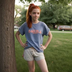 "Nicolette, now 12, stands at the edge of a park, her red hair still long but now loosely tied back in a ponytail. Her style has shifted—she wears a pair of sneakers, shorts, and a baggy t-shirt, showing the beginnings of her tomboyish transformation. There's a hint of confidence in her stance as she leans casually against a tree, arms crossed, watching Zach, her neighbor and best friend, who is busy tossing a football nearby. Her once delicate features are more relaxed and rugged now, with traces of dirt on her knees from earlier games. Though her clothes and demeanor have changed, the way she glances at Zach still shows a lingering crush, though she tries to hide it behind a playful smirk, hoping he’ll ask her to join in."