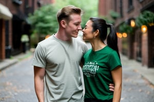 26 year old Irish American man with very short brown hair wearing a t shirt, with his fiancée who is a 25 year old Asian American woman wearing a ponytail, looking at another, kiss, kissing 