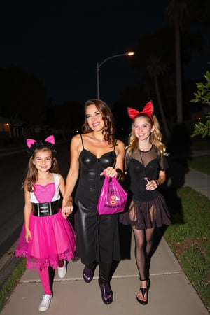 A gorgeous photo of a mother and her two  tween daughters, dressed in sexy Halloween costumes, holding a candy bag, walking on the footpath of a quiet suburban Australian street at night, trick or treaters, Halloween theme, smiling for the camera