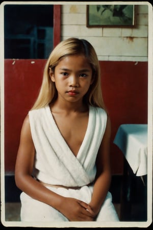 A vintage Polaroid photograph captures a young(11yo) Filipino girl's weary expression. Grainy film texture and white border evoke nostalgia. Flash photography illuminates her dyed blonde hair, striking features, and bold red lipstick. She sits patiently on a worn massage table in a dimly lit, seedy parlour. Her gaze meets the camera, a tired smile subtly spreading across her face. A loose white towel barely conceals her body as she awaits her next customer. Kodakchrome's desaturated palette adds to the photograph's analog charm.