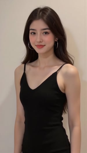  A young woman with long dark hair, wearing a black sleeveless dress and large hoop earrings