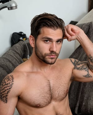 Handsome hairy man.  Arm tattoo of a dragon.  Clean shaven.