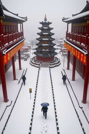 Big Wild Goose Pagoda in Xi'an, China, with heavy snow falling, a lonely pedestrian walking away in the snow, distant view, overhead shot, no one around.