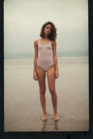 (((A timeless polaroid style photography of a effortlessly beautiful girl 13-year-old and sexy tanned skin)))
(((Iconic polaroid style photography with marked white jumping with legs apart wearing a mini-bikini with strips, navel, image was taken in 1970s. Black large wavy messy hair,sexy mini-dress, reflection, beautiful eyes, film grain, natural lighting, looking at horizon)))
(((Vintage, polaroid style photography, rule of thirds composition, grainy texture, nostalgic feel, old-school photography, soft shadows, minimalism, muted color palette, timeless elegance. --stylize 1000 --v 6.1))),digital artwork by Beksinski