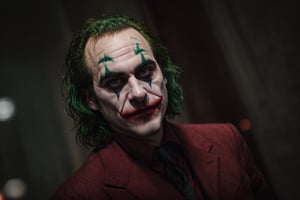 [Joker] from 2019 movie, (Joaquim Phoenix), wearing a red suit, green hair,
BREAK
,photo, rule of thirds, dramatic lighting,, detailed face, detailed nose, dark smille, , intricate background, realism, realistic, raw, analog,, portrait, photorealistic, analog, realism,Realism,More Detail