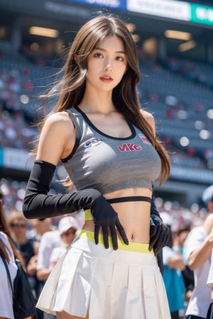 1girl, long hair, breasts, looking at viewer, blue eyes, skirt, brown hair, shirt, gloves, navel, holding, bare shoulders, medium breasts, standing, pleated skirt, parted lips, sleeveless, solo focus, black gloves, midriff, miniskirt, lips, crop top, white skirt, clothes writing, cheerleader, crowd, stadium