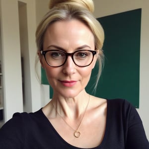 Create a selfie made with an old iphone of a (((55-year-old European female teacher))) with pale skin, perfect shape body, small_breast, pendant_breasts and a sleek silhouette, inperfect skin. She has blonde hair with a messy bun, long oval face with warm and friendly look, small thin lips, light makeup, wearing ((glasses))
