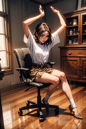 a woman is seated on a chair with her arms raised in the air. She is dressed in a white t-shirt and a leopard print skirt, adorned with a brown belt. Her hair is styled in a sleek bob, adding a touch of style to her outfit. The chair she is sitting on is white, with a gray armrest. The floor beneath her is a dark brown hardwood floor. To the left of her, a round wooden table is adorned with glasses, a purse, and a few other objects. The table is set against a white chair with a yellow pillow on it. In the background, a wooden cabinet is visible, adding to the ambiance of the room.