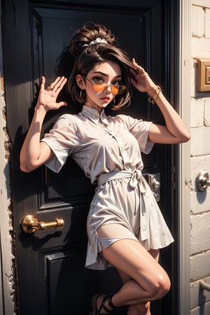 a woman stands in front of a black wrought iron door. She is dressed in a white polka dotted short-sleeved dress, adorned with black dots. Her hair is styled in a sleek bob, and she is wearing a pair of white sunglasses. She's holding a white purse in her left hand, and her right hand is raised in the air. Her left hand is resting on the door, while her right arm is stretched out to the side. The woman's left leg is slightly bent at the bottom of the frame. The backdrop is a beige stone wall, with two white pipes protruding from the right side of the image.