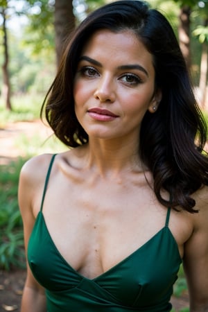 A photo of a pretty woman with long hair, bored, She wears a strappy dress, spaghetti straps, a woman, perfect hair, closeup portrait, 85mm lens, (analog, cinematic, film grain:1.3), (walking on a forest trail), ((detailed eyes)), (epicPhoto), (color picture:1.1), makeup, (looking at viewer)