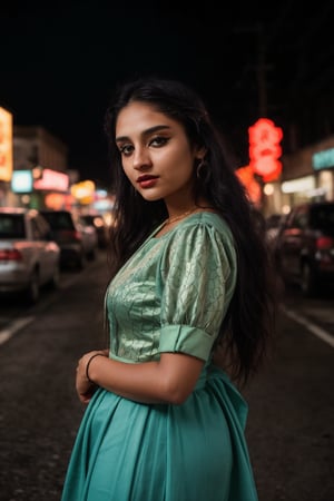 A stylish brown-skinned woman stands out against the sleek, teal-hued cityscape in a Matrix-inspired scene. The warm glow of streetlights and neon signs casts an orange filter over her, creating a striking contrast with the cool urban backdrop. She exudes confidence as she gazes out into the distance, her pose a fusion of strength and sophistication.