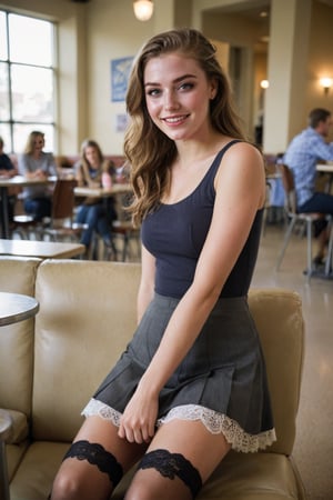 A sultry close-up shot of a young woman sitting on a couch in a college cafeteria, with a playful and coy expression. She's wearing a short flying skirt that rises slightly as she raises one leg, revealing the lace trim of thigh-highs. The camera captures her innocent smile, leaving the viewer wondering if she's aware of her own sensuality or just being playful. Soft, natural lighting illuminates her features, with a shallow depth of field blurring the background to emphasize her face and legs. The composition focuses on her legs and upper body, drawing attention to the subtle sexuality of the scene.