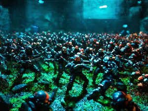 (a group of futuristic human space soldiers) fighting against a onslaught of crazy alien invaders, it is a vivid intense epic cinematic wartorn masterpiece of stop motion claymation animation action figurine type diorama display aesthetic look grandiose and vast crowded complex composition, (the humans and the alien eldritch horror creatrures are seperate do not combine them into one being) Claymutation