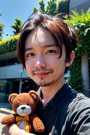 A young boy with warm brown eyes looks directly into the camera lens, his expression gentle and inviting. His light pink hair is messy and endearing, framing his heart-shaped face. He clutches a worn teddy bear in his arms, its faded fabric a testament to its importance. Wearing a crisp black collared shirt, he stands out against the lush greenery of the park, with a brilliant blue sky serving as a stunning backdrop.