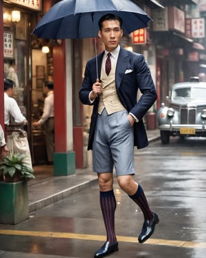 des voeux road of Hong Kong in 1930s, photorealistic, highly detailed, next to barber shop, men in suit, wearing navy over the calf socks with vertical stripes, RAW, soft lighting, detailed, solo focus, handsome chinese man, full body portrait, wearing loafers, pov_eye_contact, vintage, 1guy, muscular guy, 4K, wearing shorts, holding umbrella, raining