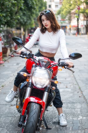 Create an image of a young woman sitting confidently on a striking red motorcycle parked on the side of a street. She has long, flowing brown hair that cascades down her shoulders, partially illuminated by sunlight. Her facial features are defined, with sharp cheekbones and a serious expression that conveys strength and determination. 

She wears a fitted white long-sleeved top that contrasts beautifully with her black pants, creating a sleek and stylish look. On her feet, she sports casual white sneakers, adding a touch of comfort to her outfit. A pair of stylish sunglasses rests on her head, catching the light and reflecting the surroundings.

The motorcycle is sleek and polished, with details that highlight its power and design. In the background, trees sway gently in the breeze, and modern buildings rise, creating an urban atmosphere. The woman holds the handlebars of the motorcycle firmly with both hands, looking directly at the camera, exuding confidence and a sense of adventure. The overall composition captures a moment of intensity and style, set against a vibrant street scene.