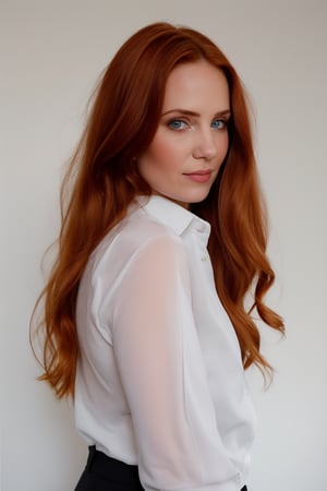 A portrait of a young woman as she poses confidently in front of a crisp grey backdrop, while her long ginger hair runs falls over one her shoulders. She wears an formal white fitted shirt, its simplicity showcasing her delicate features (smile:0.4). Softbox lights gently highlight her porcelain skin. 