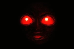 beksinskiart, a creepy face with glowing eyes in the dark
black background, no humans, glowing, glowing eyes, red eyes, simple background, eye focus, dark