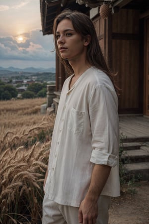 Full body shot, a long-haired young man walks through a wheat field, There is a noise in the distance, as if whispering an unknown secret, The breeze blows his long hair, as if it carries a voice from space, The detailed facial reality and expressions rich, angular face, no beard, small nose, long hair, long bangs, fine hair, Japanese fashion, white linen uniform monastic style, ancient pagoda, ancient round courtyard, high mountain with white clouds, built on clouds above, morning glow, sunrise, realistic environment, shining, 8k, best quality, top quality, focal length 85mm, Samsung MF 85mm f/1.4 WS Mk2, bokeh background, blurred background, depth of field, water,