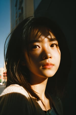 realistic,portrait,film grain,shadow,dark,asian,woman,sunlight,day,epic,fantastic,street,messy hair,light,grainy,real photo,outdoor,grainy,lightshapes