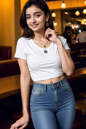 Lovely cute hot Alia Bhatt, acute an Instagram model 22 years old, full-length, long blonde_hair, black hair, They are wearing a scretch black jeans and transparent tshirt cool blue light colour. The background cafe drinking water. indian cafe, necklace on sarees, photo pose smile, garden_background