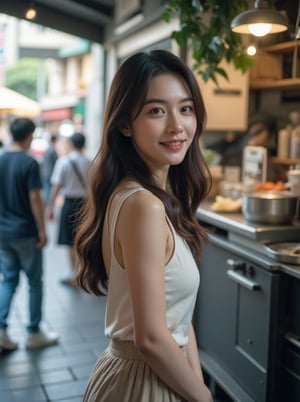 A Korean woman, the protagonist, stands sideways with a warm smile, her long hair flowing down to her waist. She wears no sleeves on her outfit and has a skirt. Amidst the crowd, some people walk left while others walk right. The camera captures her serene expression and figure from within the shop's kitchen window, which blurs through a subtle vignette effect, showcasing her amidst the bustling outdoors. Medium shot, full frame, with a slight depth of field to emphasize the protagonist's features.