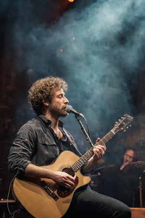 Step into a captivating portrait capturing the essence of a musician, their fingers dancing across the strings of a guitar on a vibrant stage. Through the lens of a Sony α7 III camera, equipped with a 100mm lens set to a wide-open aperture of F 1.2, the background seamlessly dissolves into a tapestry of artful bokeh, allowing the subject to command the spotlight. The stage radiates with dramatic lighting, as spotlights cut through the velvety haze of smoke, creating a dynamic and immersive atmosphere. Employing the iconic Rembrandt lighting technique, the musician’s face and hands are skillfully bathed in soft, directional light, accentuating every passionate expression and intricate movement. Harnessing the powerful Midjourney v5 with photorealism mode, this image transcends mere representation, vividly capturing the musician’s unwavering talent and boundless devotion. With each strum of the guitar, the viewer becomes entranced by the artist’s undeniable passion, transported to a realm where music becomes a living, breathing entity.