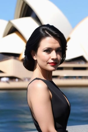 modern 33 year dark hair, elegant woman posing outside  sydney opera House