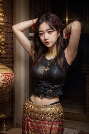 The image features a woman with long dark hair, wearing a black top and a traditional, ornate skirt with gold and red accents. She has her left hand on her head, and her right hand is on her hip. She is wearing a necklace with a large pendant and has a neutral expression on her face. The style of the image is a fashion or portrait photograph with a focus on the subject's attire and pose.((arms up))
