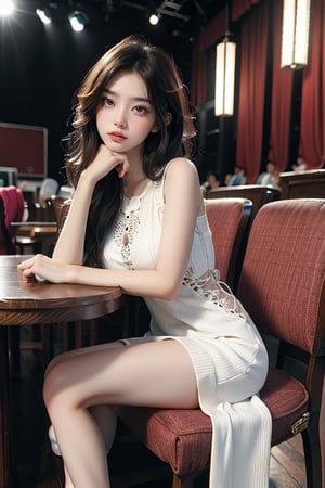 (panoramic), (cowboy shot),1girl, solo, looking at viewer, brunette, dress, sitting, indoors, white dress, lips, chair, chinese clothes, table, crossed legs, pink dress, theater lights