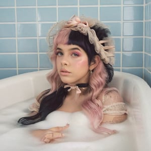 1girl, long straight split dye mullet hair with bangs, black and pink hair, light gray tulle frill shepherd's hat, bath, bathroom, a tub of water,  blue tiles, retro style, retro, retro colors, nose ring, brown eyes, cute face, long lashes, gold elements, lips dirty pink, black eyebrows, pale skin, high quality 18K, Hyperrealism, Realistic vision, rosy cheeks, freckles, high eyes quality, high face quality,Pink dress,Split dye hair,Pink and black split dye hair,Martinez,Adele,Melanie,Bows,Ribbons,High School Sweethearts,Hssh 