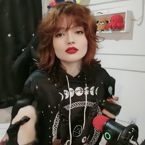 r4luc4, black eyes, red hair, black blouse, lipstick,