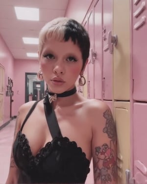 a close up shot of a woman, she has split dyed hair (white and black) she has a mullet, she has on a black dress, the background is a school hallway, the hallway is pink and the lockers are pastel colours.