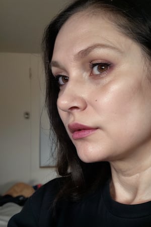 Very realistic photo of a 60 year old woman with shiny oily pale skin in a bedroom. She has long black hair in a ponytail, a beautiful face with beautiful sparkling eyes and prominent high cheekbones with some lines and wrinkles. small face, delicate face, botox, fillers, fat lips, purple lipstick, She is wearing a black t-shirt and black trousers, slacks, front view, turning head towards the viewer, looking to the side, chubby face, elegant, 