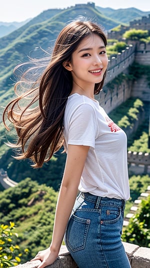 Elena is standing on the Great Wall of China and smiling. She is wearing a simple and fashionable colorful T-shirt and short blue jeans and sneakers, and her long hair is waving in the wind. In her background is the winding Great Wall of China and rolling green mountains. The sunlight is soft and adds warm colors to the photo. The 16-year-old high school student is smiling.