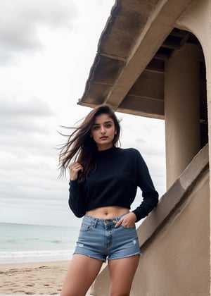 Lovely cute hot Alia Bhatt, acute an Instagram model 22 years old, full-length, long blonde_hair, Slim-fit jeans, cozy sweater, black hair, summer, on a beachside, Indian, wearing a black color top and shorts jeans, Straw tote bag