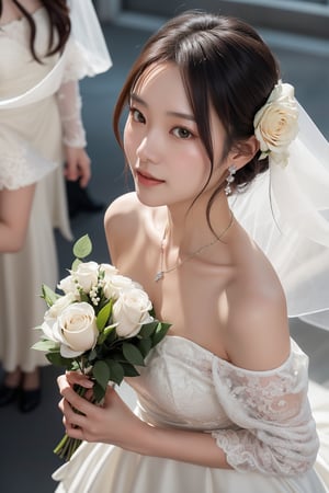 Captured from a high-angle perspective, a beautiful young Asian woman, dressed in a white strapless wedding dress, adorned with a necklace and earrings. She is holding a bouquet of white roses, her hair cascading down her shoulders, adding a touch of beauty to the scene. The backdrop is blurred, creating a stark contrast to her white dress.