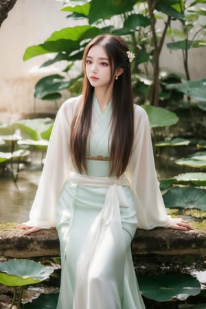 A beautiful woman in a white Hanfu dress sits on a lotus leaf, her flowing skirt and delicate face framed by hair cascading down to her waist. She is surrounded by large green leaves, against a soft yellow background, with gentle lighting creating a dreamy atmosphere. The photograph uses a wide-angle lens, presenting an elegant posture in the style of ancient Chinese art.