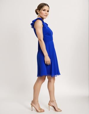 Sophia Bush wears Royal Blue Dress with her bun side view.