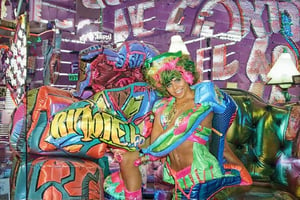 An award winning museum quality Photograph, of a man and a woman wearing multi-colored inflatable outfits, in a funky love hotel having sexual intercourse, well lit cinematic lighting, complex shadows, extremely detailed , hotshoe flash on subject, text reads:"love hotel" , 1990s Photoshop 
style, in the style of Raphael, 