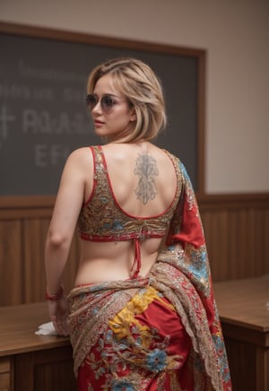 A captivating photo from the back of a plus-size curvy  thick Arabian bodybuilder woman in a lecture hall. She is dressed in a vibrant gown , with a fully open back blouse that reveals intricate tattoos covering her entire back. Her stylish sunglasses and impeccably styled short golden hair add to her striking look. The saree drapes beautifully over her strong, muscular figure, blending traditional elegance with modern strength. chatting with her core staff, The lecture hall is filled with subtle academic elements, like desks and chalkboards, complementing her confident and commanding presence