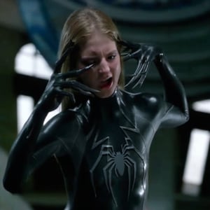 Sophia valverde angry rage ripping the black liquid latex symbiote slime , female , blonde hair , long hair, 1girl, symbiote tendrils, Spider-Man 3, realistic style, slim body shape, sexy female body, girl sexy, bell tower background ,  girl screaming , beautiful girl screaming , 18 year old girl 