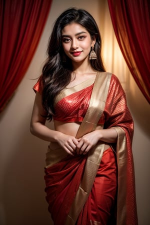 A woman, dressed in a vibrant red saree with intricate sequined borders, stands out against a dark, plain backdrop, highlighting the garment's bold color. Her long, straight hair falls to one side as she smiles softly, her traditional earrings and small bindi adding to the overall sense of cultural elegance. The composition is simple yet effective, allowing the beauty of the saree and the subject's subtle smile to take center stage.